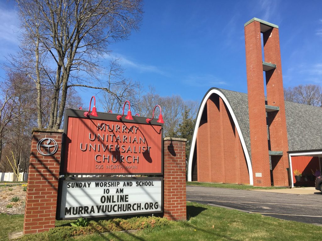 Photo of the front of church and sign